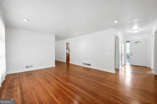3050 Rebecca Dr SW, Atlanta, GA 30311 - spare room with wood finished floors, crown molding, and recessed lighting