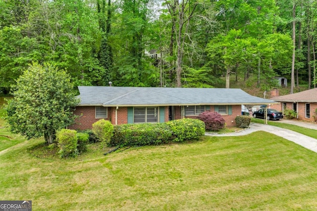 3050 Rebecca Dr SW, Atlanta, GA 30311 - ranch-style house featuring driveway, brick siding, and a front yard