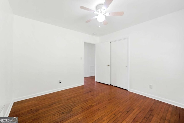 3050 Rebecca Dr SW, Atlanta, GA 30311 - unfurnished bedroom with hardwood / wood-style floors, ceiling fan, and a closet