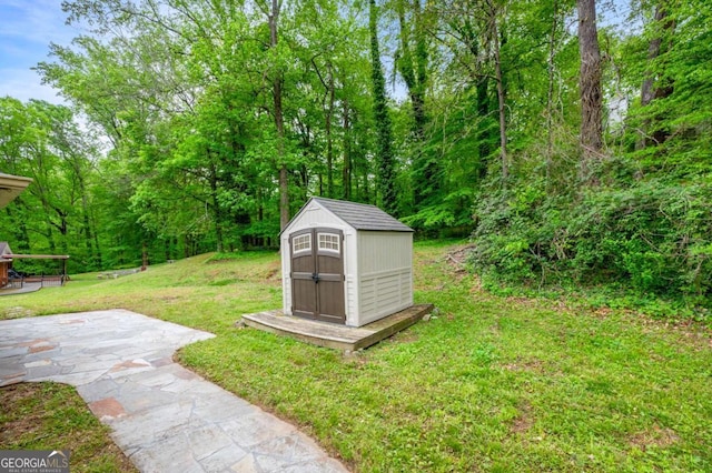 3050 Rebecca Dr SW, Atlanta, GA 30311 - view of green lawn with a shed and a patio