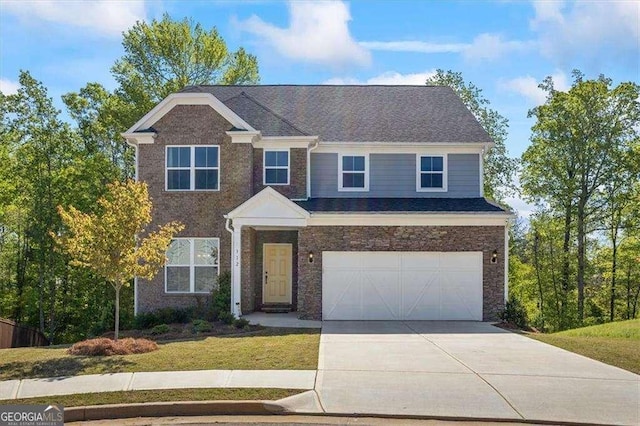 312 Wichita Way, Mcdonough, GA 30253 - traditional-style home with an attached garage, a front yard, and concrete driveway