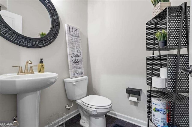 312 Wichita Way, Mcdonough, GA 30253 - bathroom with baseboards and toilet