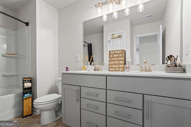 312 Wichita Way, Mcdonough, GA 30253 - full bath with double vanity, visible vents, toilet, and a sink