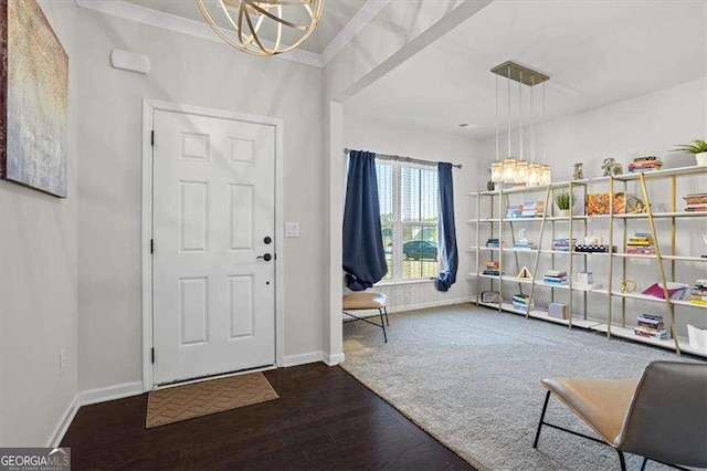 312 Wichita Way, Mcdonough, GA 30253 - foyer entrance featuring wood finished floors, baseboards, and an inviting chandelier