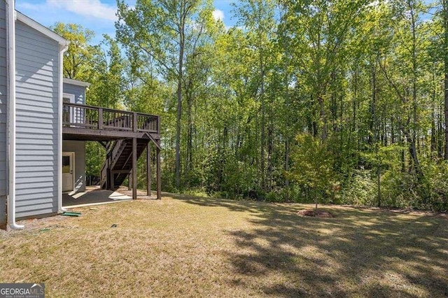 312 Wichita Way, Mcdonough, GA 30253 - view of yard featuring stairway and a deck