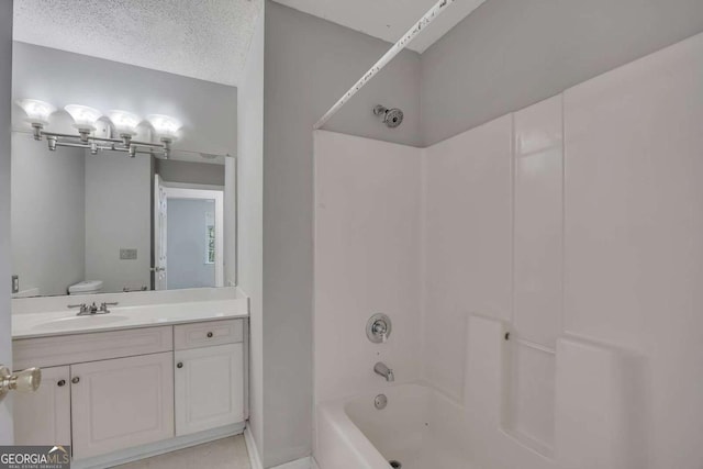 full bath featuring shower / bathtub combination, vanity, and toilet