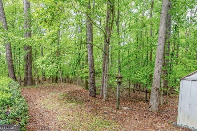 view of landscape with a view of trees