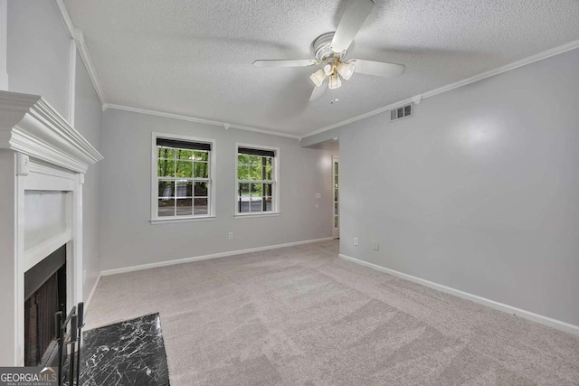 unfurnished living room featuring visible vents, a textured ceiling, ceiling fan, and crown molding