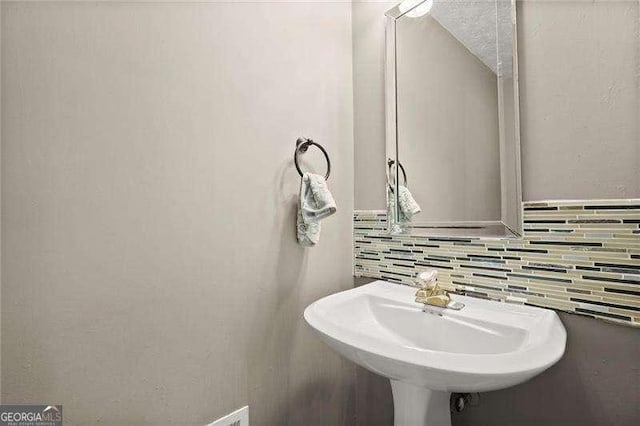 bathroom with backsplash
