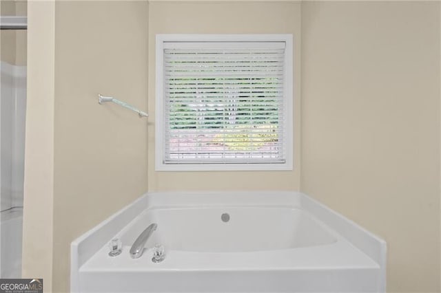 bathroom featuring a bath