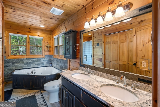 full bathroom featuring a garden tub, toilet, wood ceiling, and a sink
