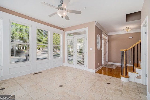 unfurnished sunroom with french doors
