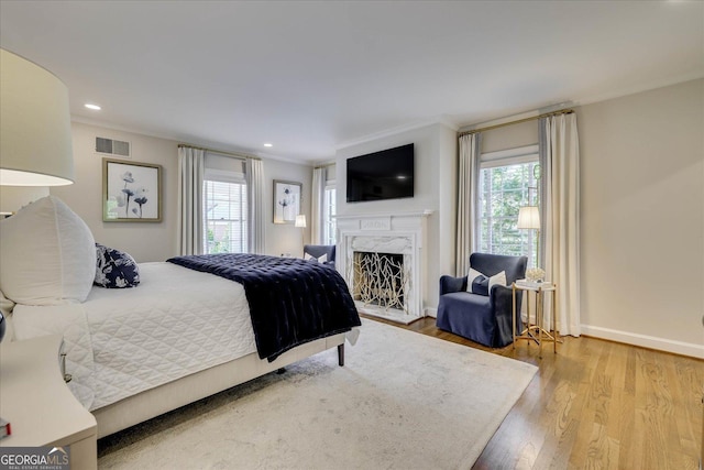 5 Prather Woods Ln, Augusta, GA 30909 - bedroom featuring a premium fireplace, wood finished floors, visible vents, and ornamental molding