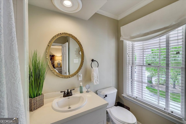 5 Prather Woods Ln, Augusta, GA 30909 - bathroom featuring toilet, ornamental molding, vanity, and plenty of natural light