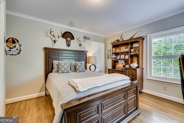 5 Prather Woods Ln, Augusta, GA 30909 - bedroom with light wood-style floors, visible vents, baseboards, and ornamental molding