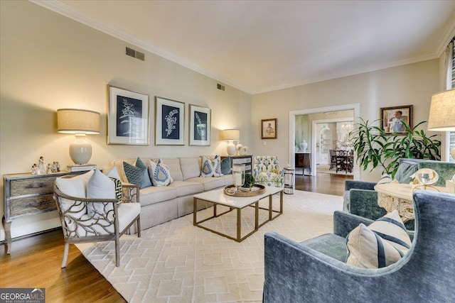 5 Prather Woods Ln, Augusta, GA 30909 - living room with wood finished floors, visible vents, and ornamental molding