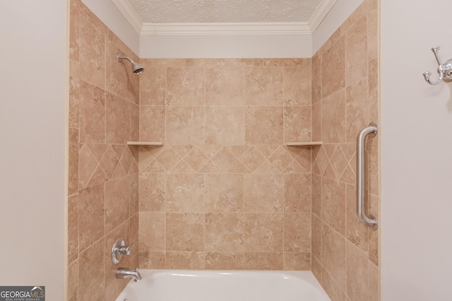 bathroom with a textured ceiling, shower / tub combination, and ornamental molding