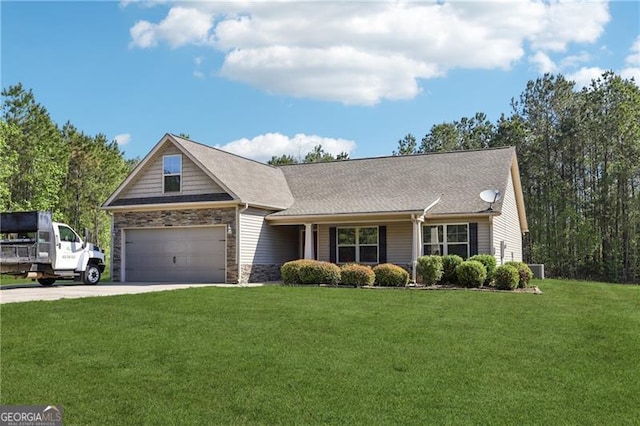 view of front of property featuring a shingled roof, stone siding, a garage, a front yard, and concrete driveway