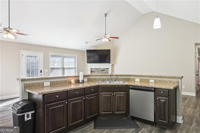 kitchen with a sink, ceiling fan, lofted ceiling, and dishwasher