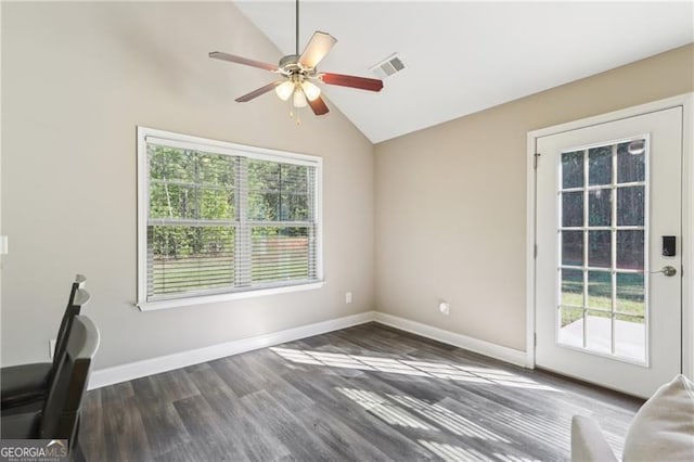 unfurnished office with ceiling fan, visible vents, a healthy amount of sunlight, and lofted ceiling