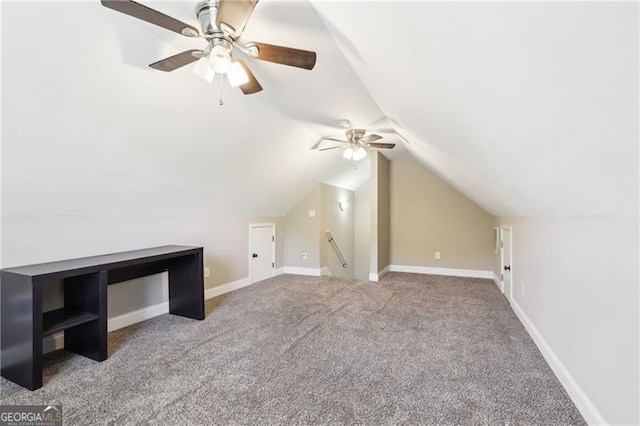 bonus room featuring baseboards, carpet flooring, ceiling fan, and vaulted ceiling