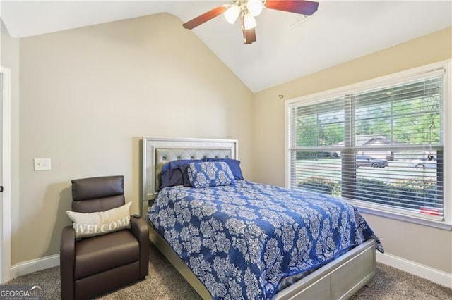 carpeted bedroom featuring a ceiling fan, baseboards, and lofted ceiling