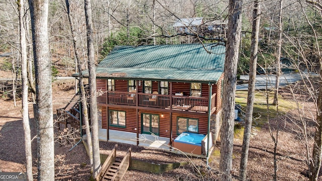 30 The Forest Rd, Blue Ridge, GA 30513 - back of house with a wooden deck, a patio area, log veneer siding, and metal roof