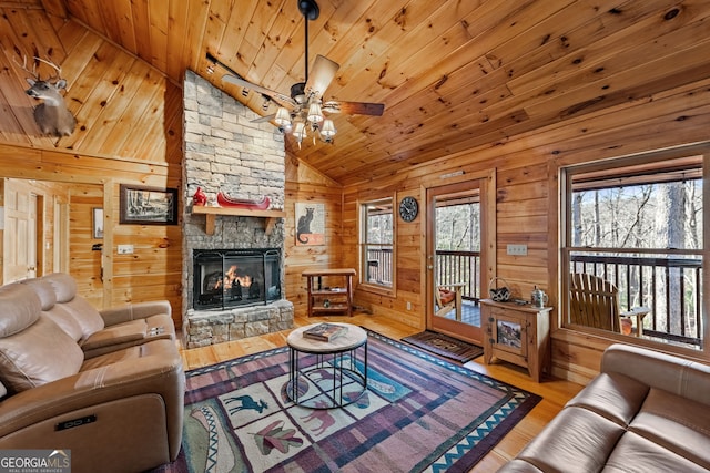 30 The Forest Rd, Blue Ridge, GA 30513 - living area featuring lofted ceiling, wood finished floors, wood ceiling, a fireplace, and ceiling fan