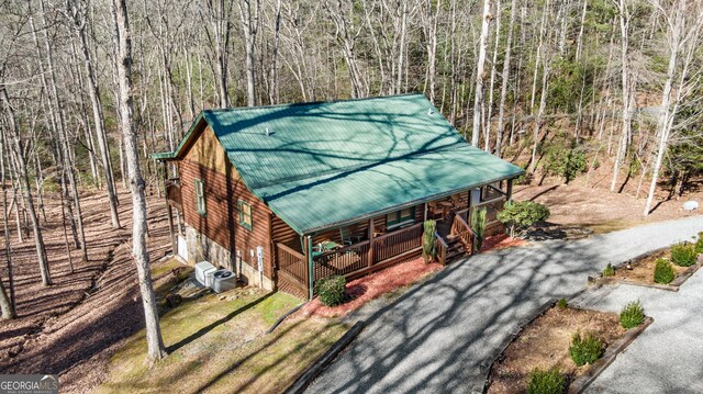 30 The Forest Rd, Blue Ridge, GA 30513 - view of front of property with metal roof, a forest view, and covered porch