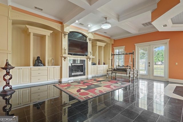living area with beamed ceiling, granite finish floor, baseboards, visible vents, and crown molding