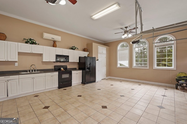 kitchen featuring black appliances, dark countertops, ceiling fan, a sink, and a wall unit AC