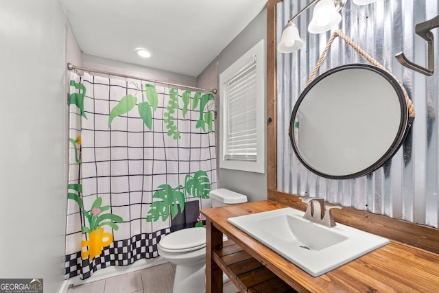 bathroom with vanity, toilet, and a shower with shower curtain