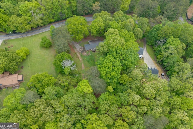 drone / aerial view with a forest view