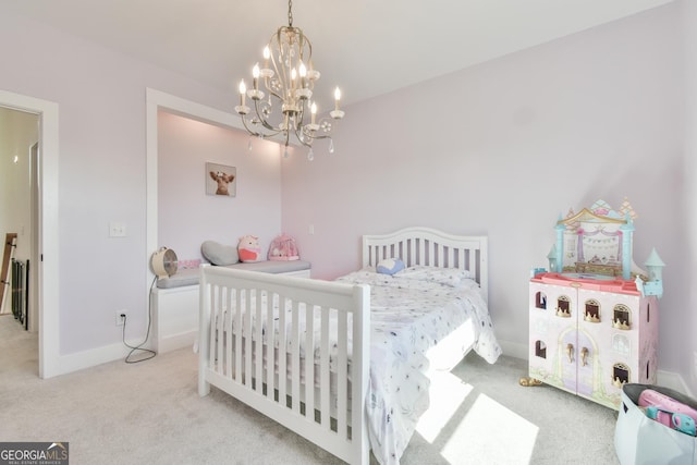 5315 Hendrix Rd, Cumming, GA 30040 - carpeted bedroom with an inviting chandelier and baseboards