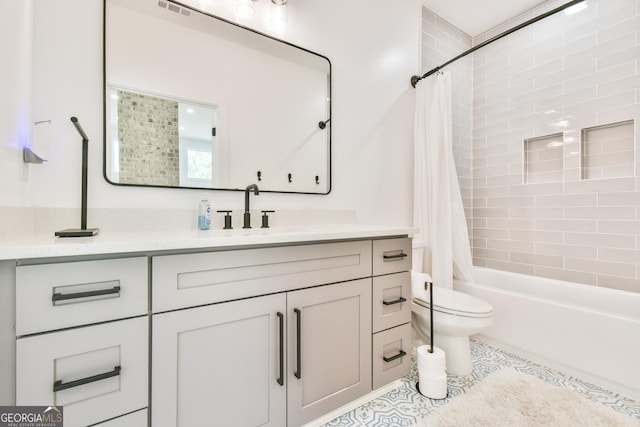 5315 Hendrix Rd, Cumming, GA 30040 - full bathroom with vanity, toilet, tile patterned floors, shower / bathtub combination with curtain, and visible vents