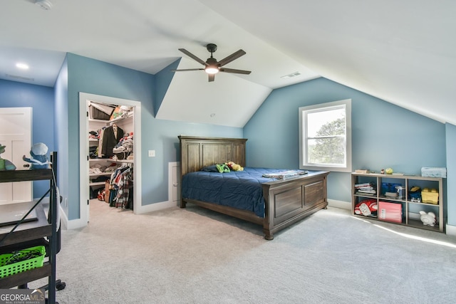 5315 Hendrix Rd, Cumming, GA 30040 - carpeted bedroom featuring visible vents, baseboards, a walk in closet, and a closet