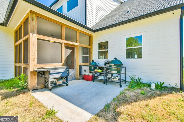 5315 Hendrix Rd, Cumming, GA 30040 - view of patio / terrace with a sunroom