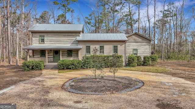 590 Dogwood Way, Richmond Hill, GA 31324 - view of front of property with covered porch and metal roof