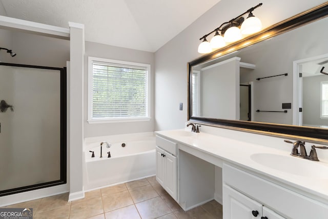 1650 Berryhill Rd, Cumming, GA 30041 - bathroom featuring a bath, vaulted ceiling, a sink, and a stall shower