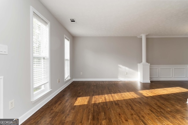 1650 Berryhill Rd, Cumming, GA 30041 - unfurnished living room with baseboards, visible vents, and dark wood-style floors