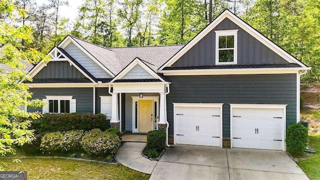 6859 Winding Wade Trl, Austell, GA 30168 - craftsman-style home with board and batten siding, driveway, and a garage