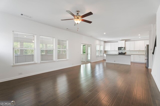 1953 Azure Grove Ct, Marietta, GA 30008 - unfurnished living room with dark wood finished floors, baseboards, visible vents, recessed lighting, and ceiling fan