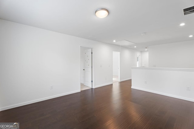 1953 Azure Grove Ct, Marietta, GA 30008 - spare room featuring wood finished floors, attic access, baseboards, visible vents, and recessed lighting