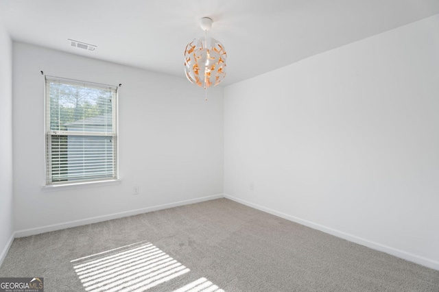 1953 Azure Grove Ct, Marietta, GA 30008 - carpeted empty room with a chandelier, visible vents, and baseboards