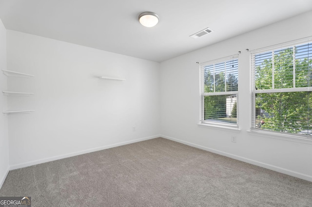 1953 Azure Grove Ct, Marietta, GA 30008 - spare room featuring baseboards, visible vents, and carpet