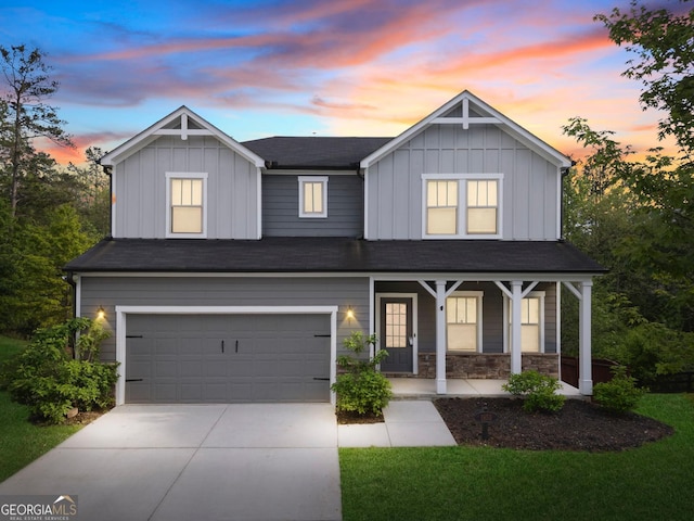 1953 Azure Grove Ct, Marietta, GA 30008 - view of front of property with an attached garage, driveway, a porch, and board and batten siding