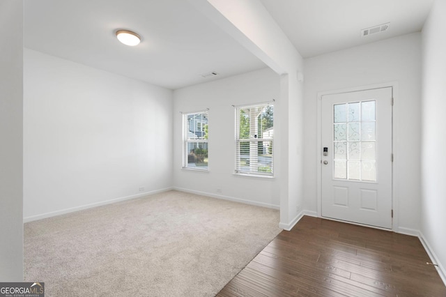 1953 Azure Grove Ct, Marietta, GA 30008 - entrance foyer featuring dark wood finished floors, visible vents, and baseboards