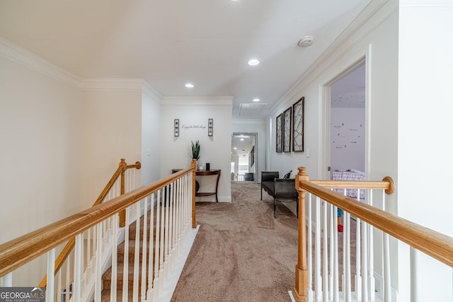 hall featuring recessed lighting, ornamental molding, an upstairs landing, attic access, and light colored carpet
