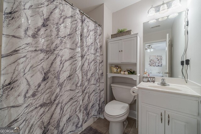 bathroom featuring toilet, visible vents, a ceiling fan, tile patterned flooring, and vanity