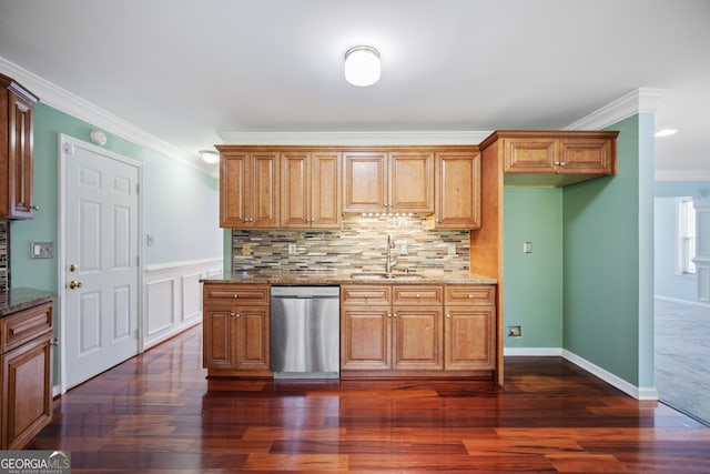 kitchen with dishwasher, a sink, crown molding, stone counters, and dark wood-style floors